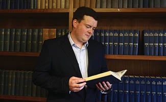 Matthew Channon in law library.