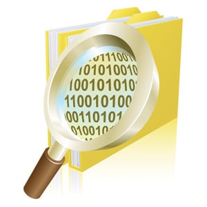 Magnifying glass looking into files