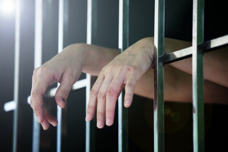 woman hands jail