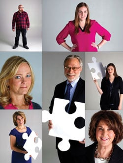 People holding puzzle pieces