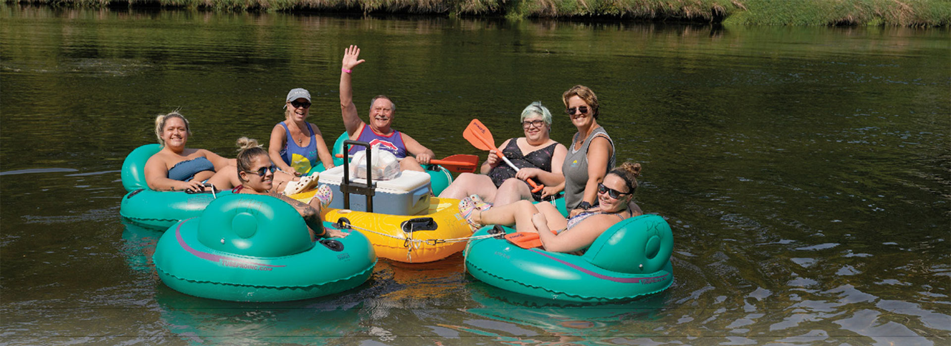 Tubers enjoying the DuPage River where property owners want to restrict public access