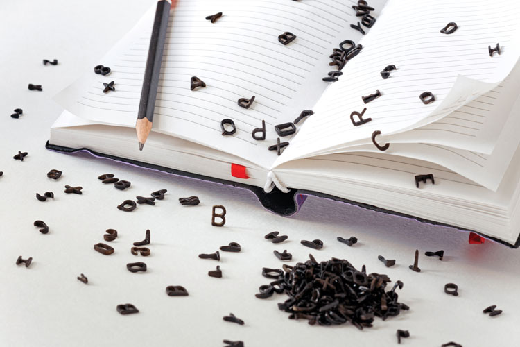 Letters scattered over a notebook