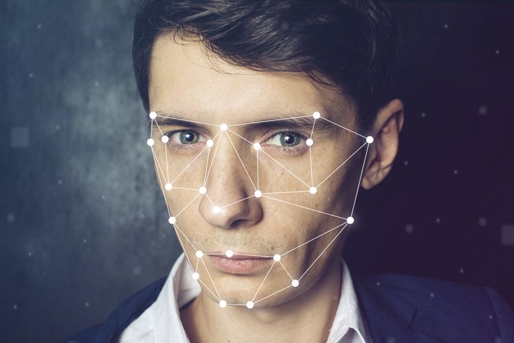 man with face recognition software