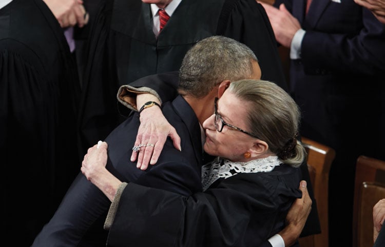 President Barack Obama hugs Justice Ginsburg