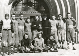 Men in front of building