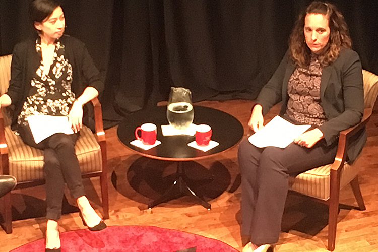 Jess Cheng and Amy Hartman seated on stage.