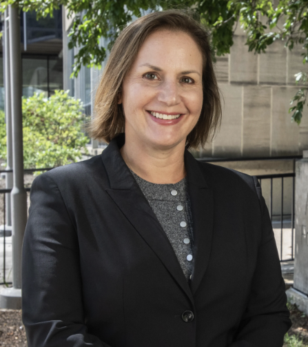 Woman in dark suit