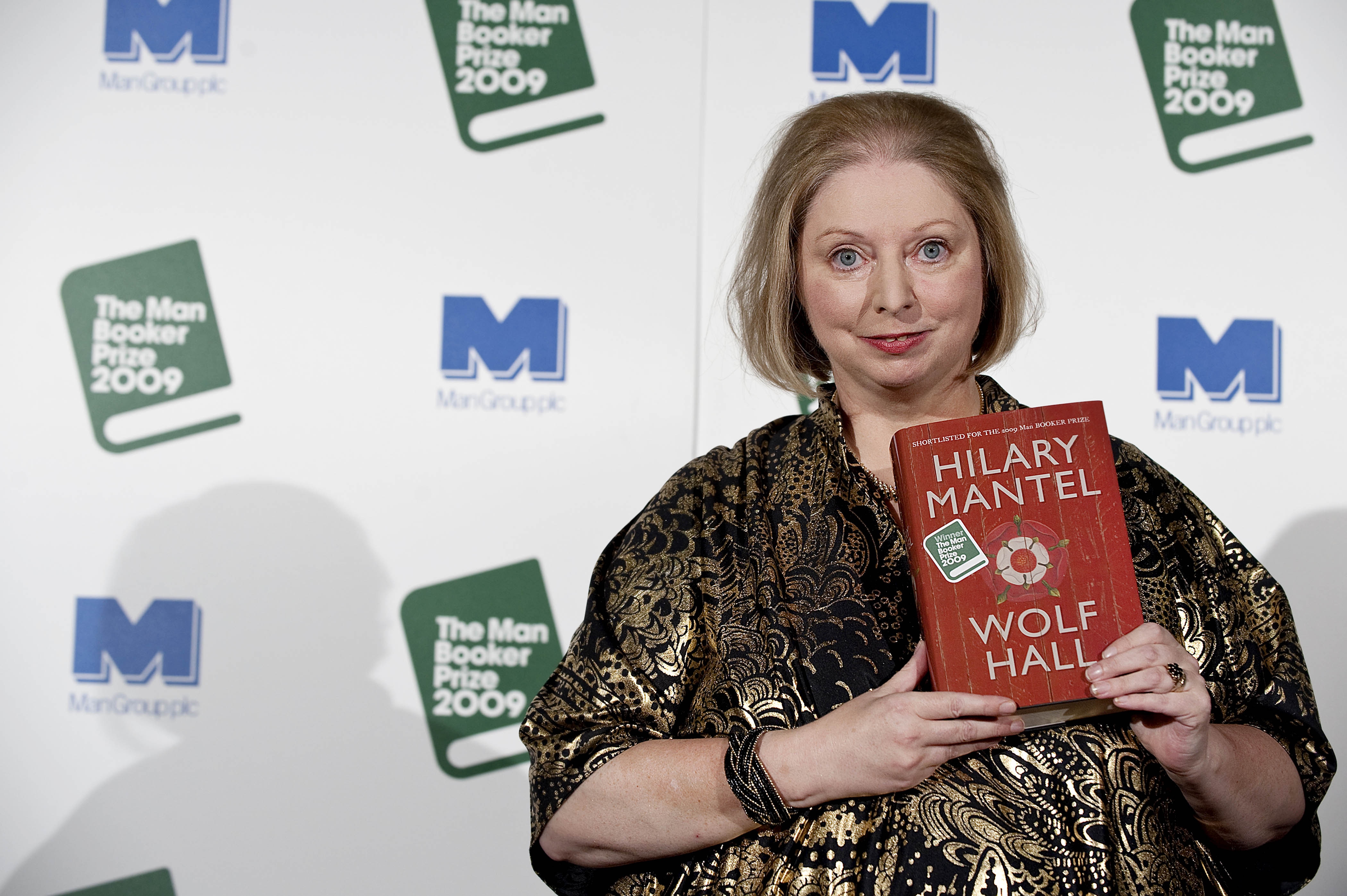 Author Hilary Mantel holds a copy of 'Wolf Hall'