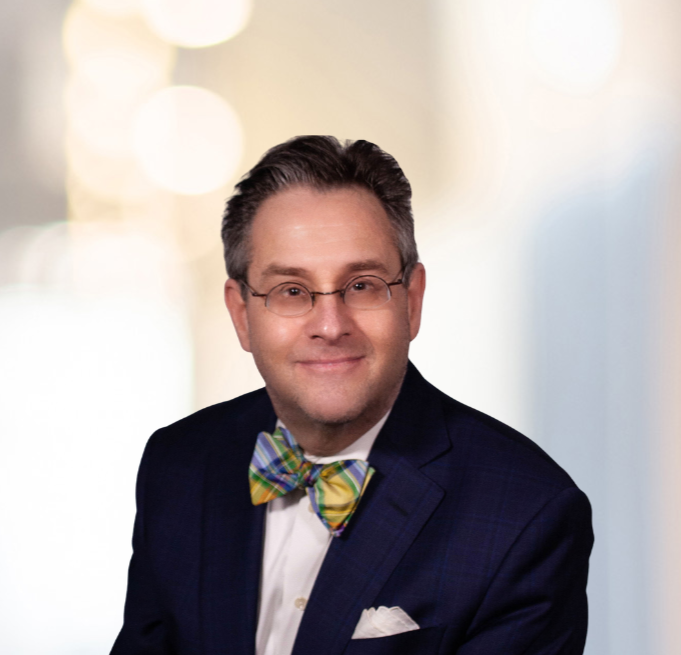 Picture of man in suit and bow tie - Randy Maniloff