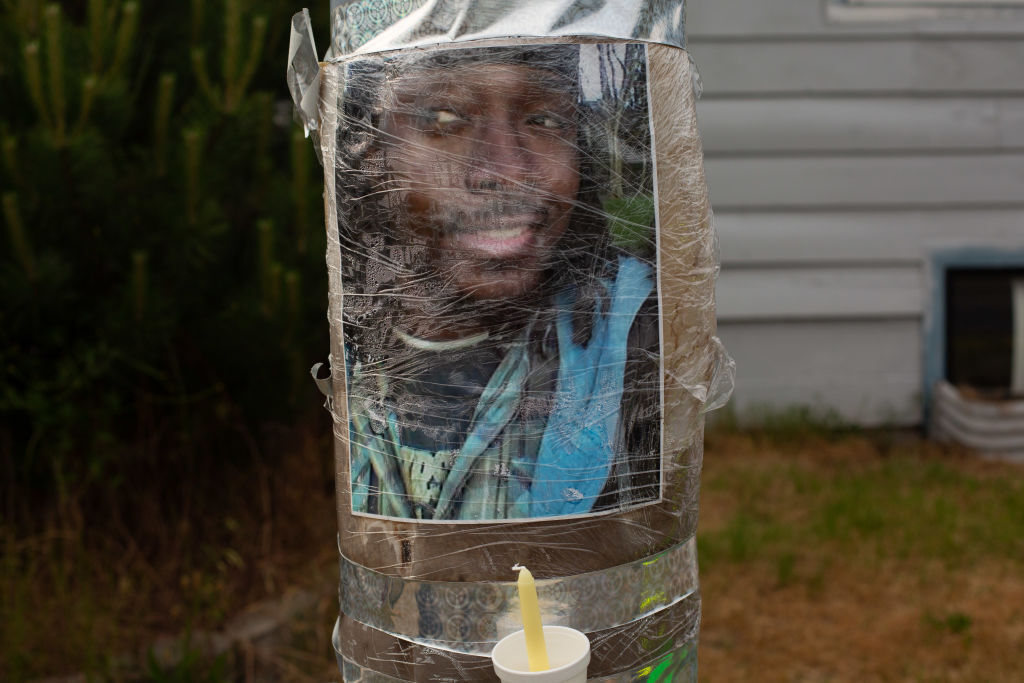 Photo of Manuel Ellis taped to a utility pole