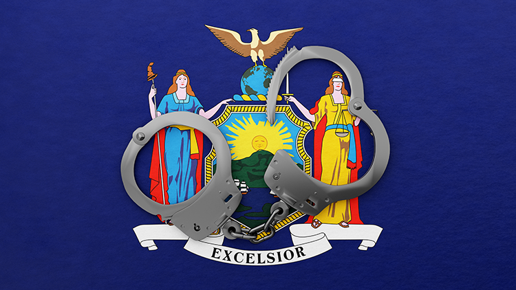 State flag of New York and a set of open handcuffs