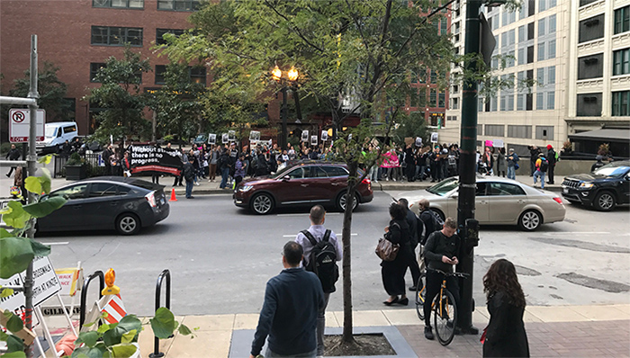 Photo from the steps of the ABA building showing protesters across the street