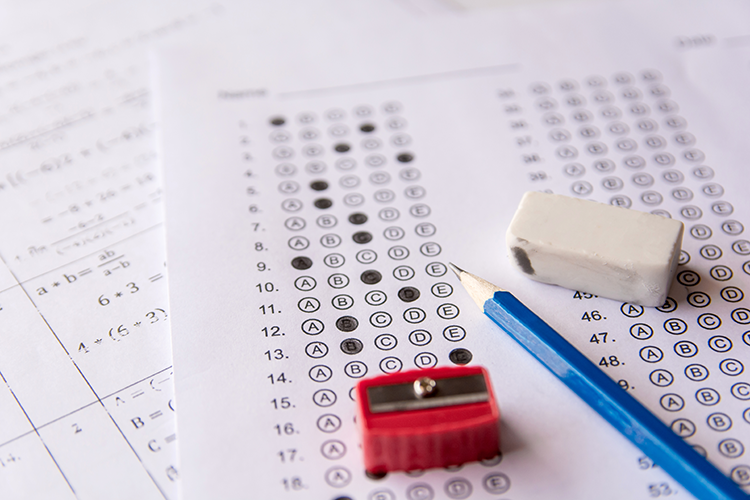 Standardized test with pencil, sharpener and eraser