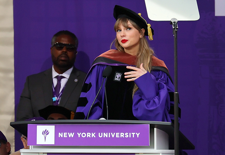 Taylor Swift in a graduation gown