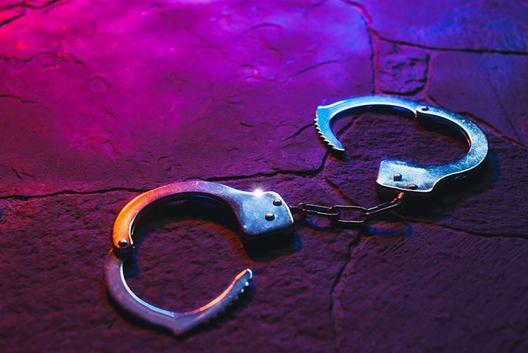handcuffs and police lights