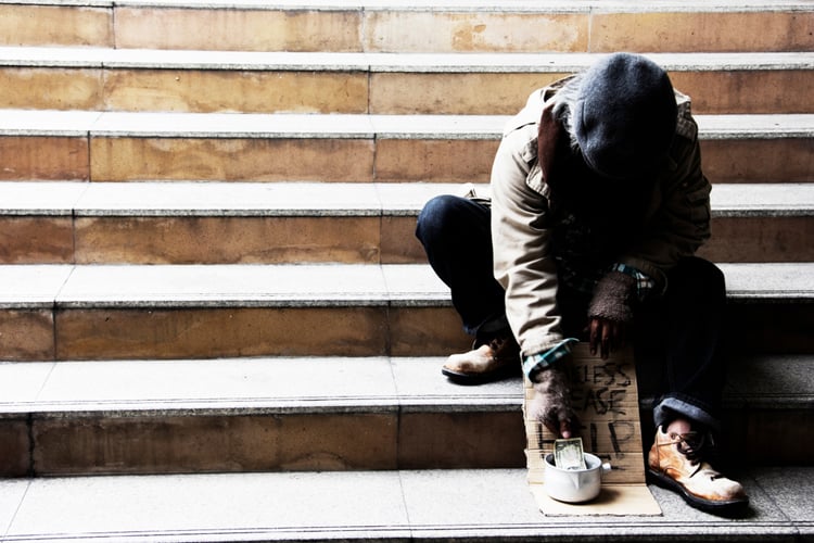 homeless person on steps