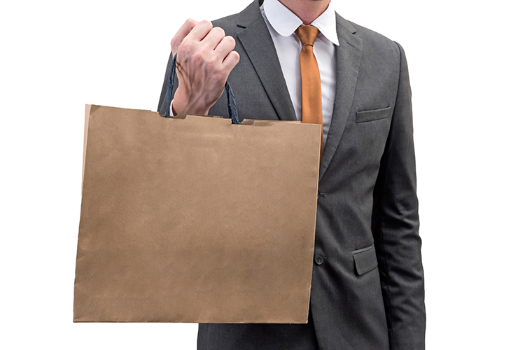 Lawyer holding a shopping bag