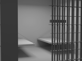 Prison cell with door ajar
