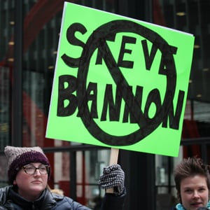 Steve Bannon protest sign.