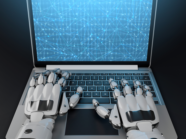robot hands typing at a computer