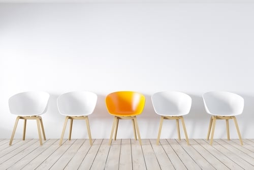 shutterstock_Row of chairs with one odd one out