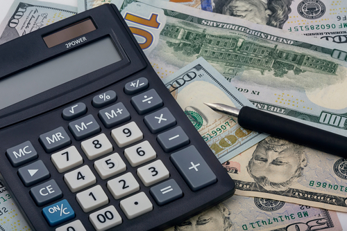 shutterstock_calculator and money