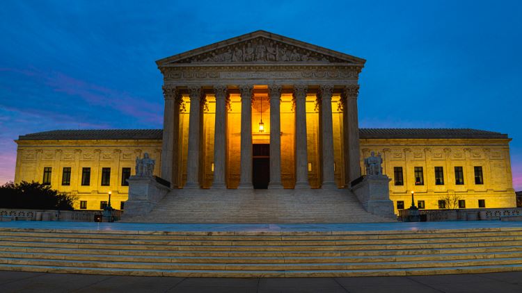 SCOTUS building at night