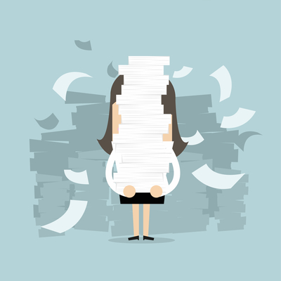 Woman holding a giant paper stack.